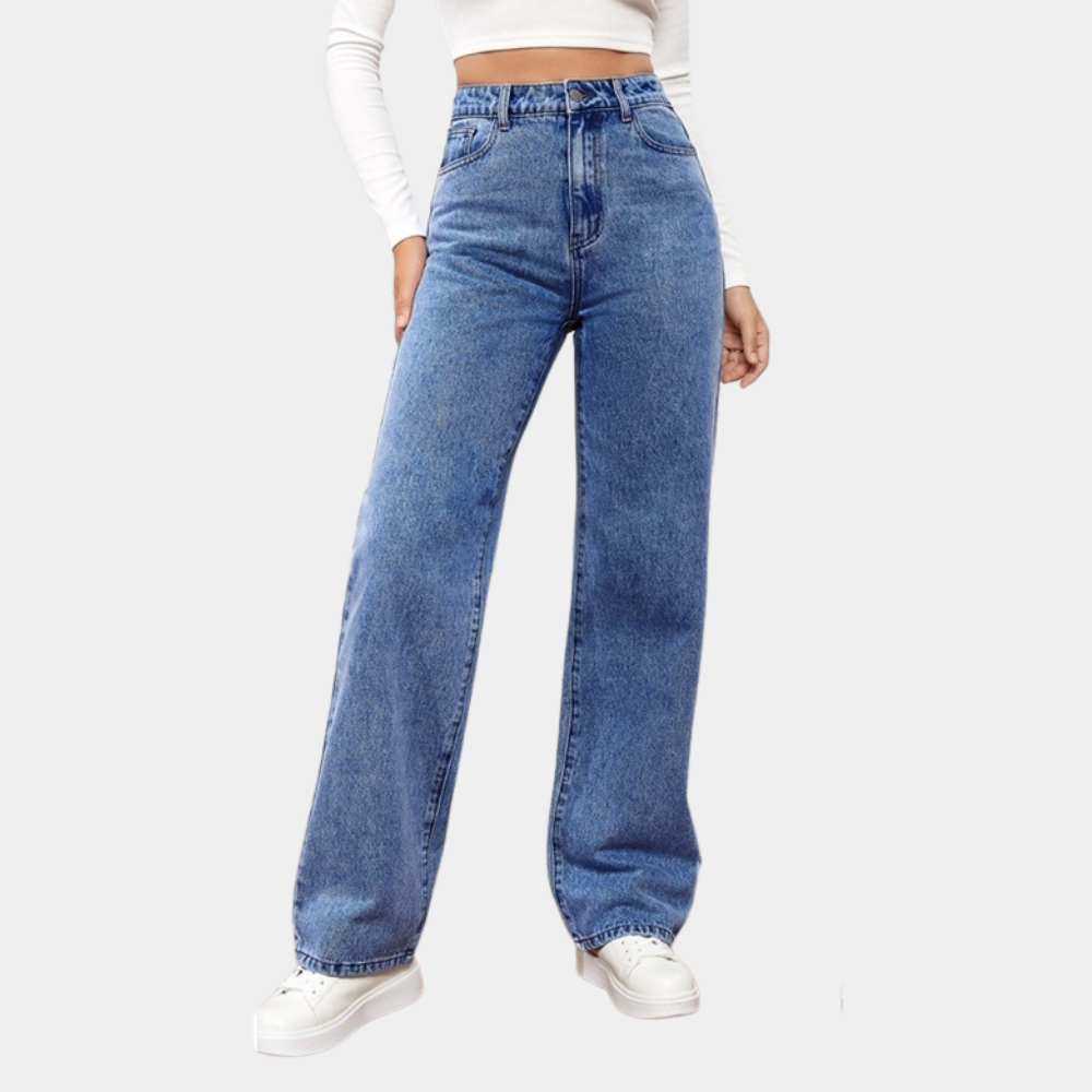 High-Waist-Baggy-Jeans perfekt kombiniert mit Crop-Top und Sneakers.