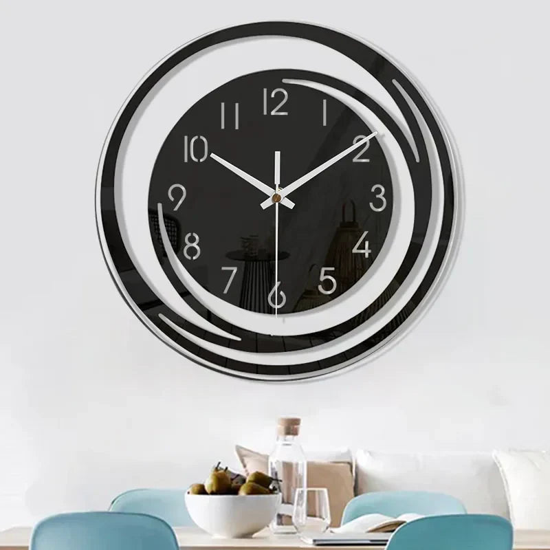 Minimalistische Wanduhr mit schwarzem Zifferblatt und weißem Design.