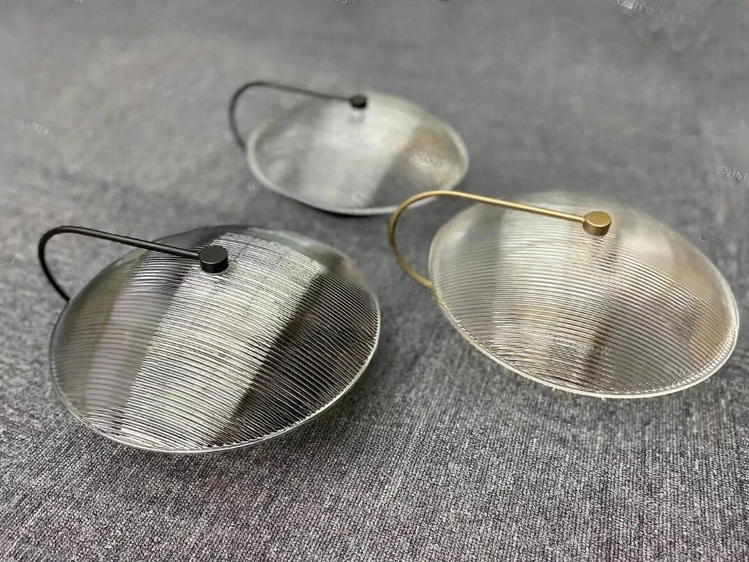 Verleihen Sie Ihrem Raum Eleganz mit der GlowDisk Wandlampe im besonderen Design.