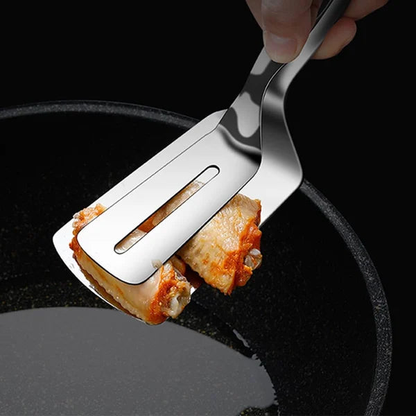 Detailansicht eines flexiblen Spatels mit ergonomischem Griff.
