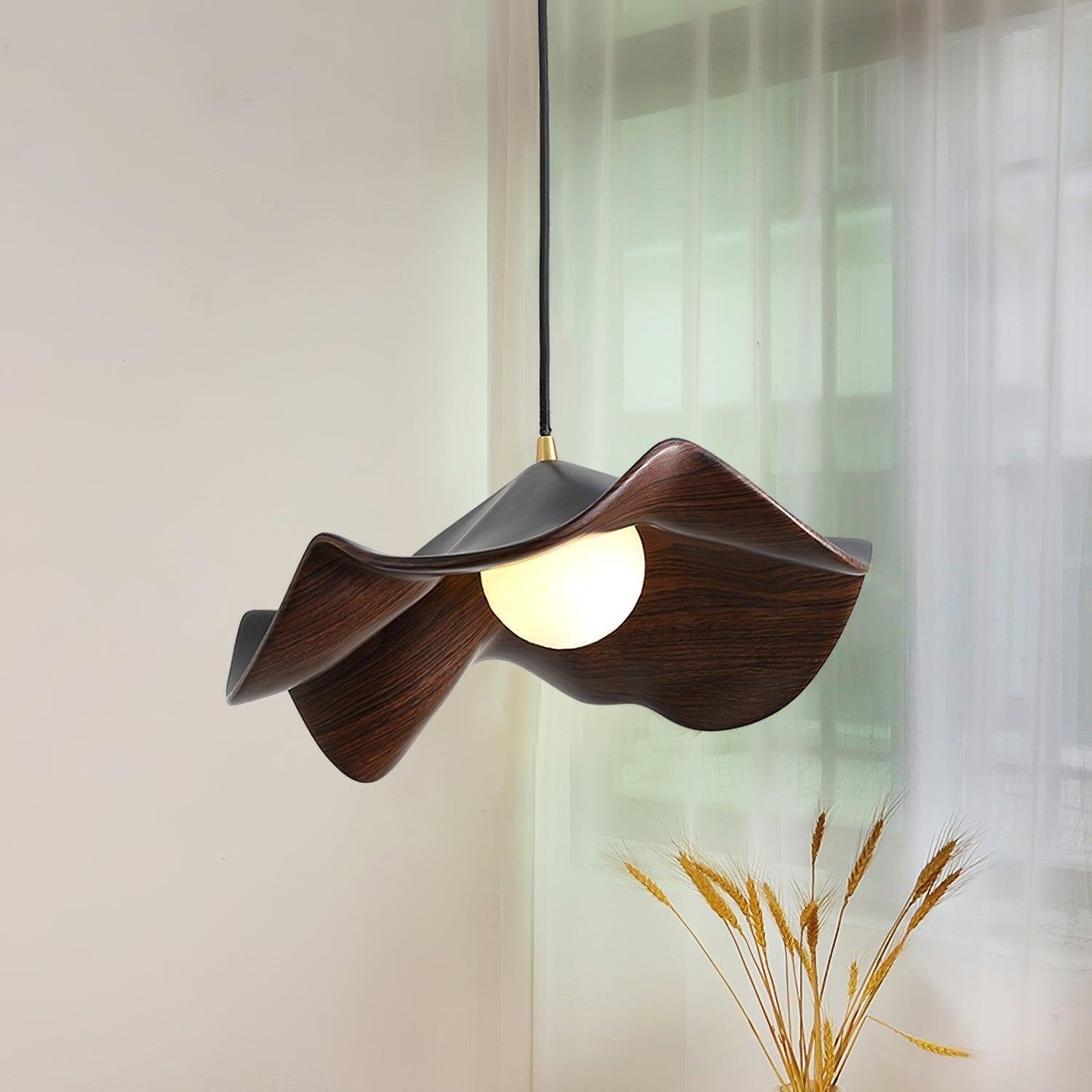Casia Wave - Kreativ gestaltete Pendellampe mit innovativem dekorativem Design.
