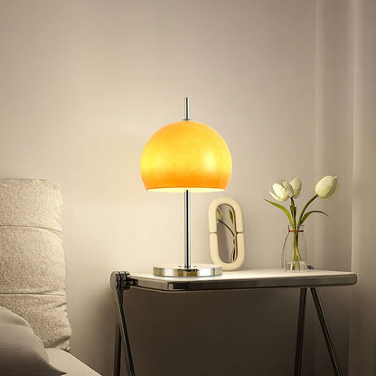 AmberLume Tischleuchte für eine moderne und gemütliche Atmosphäre.